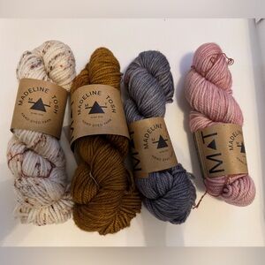 4 skeins Mad Tosh triple twist.  130 yards each.